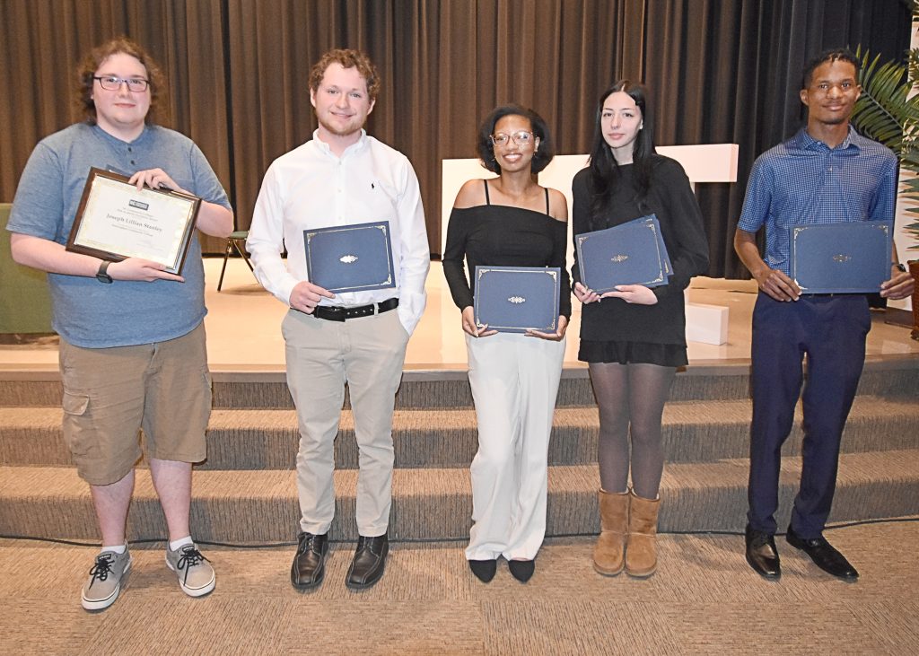 Picture of 5 students holding certificates