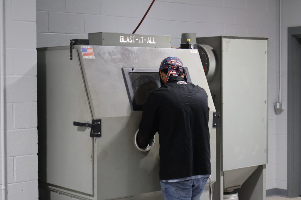 Student practicing welding.