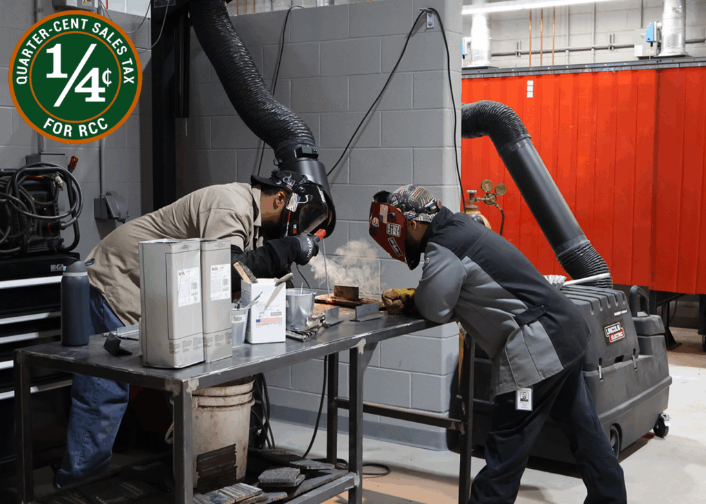 Two students welding. Classroom paid for by the quarter-cent sales tax