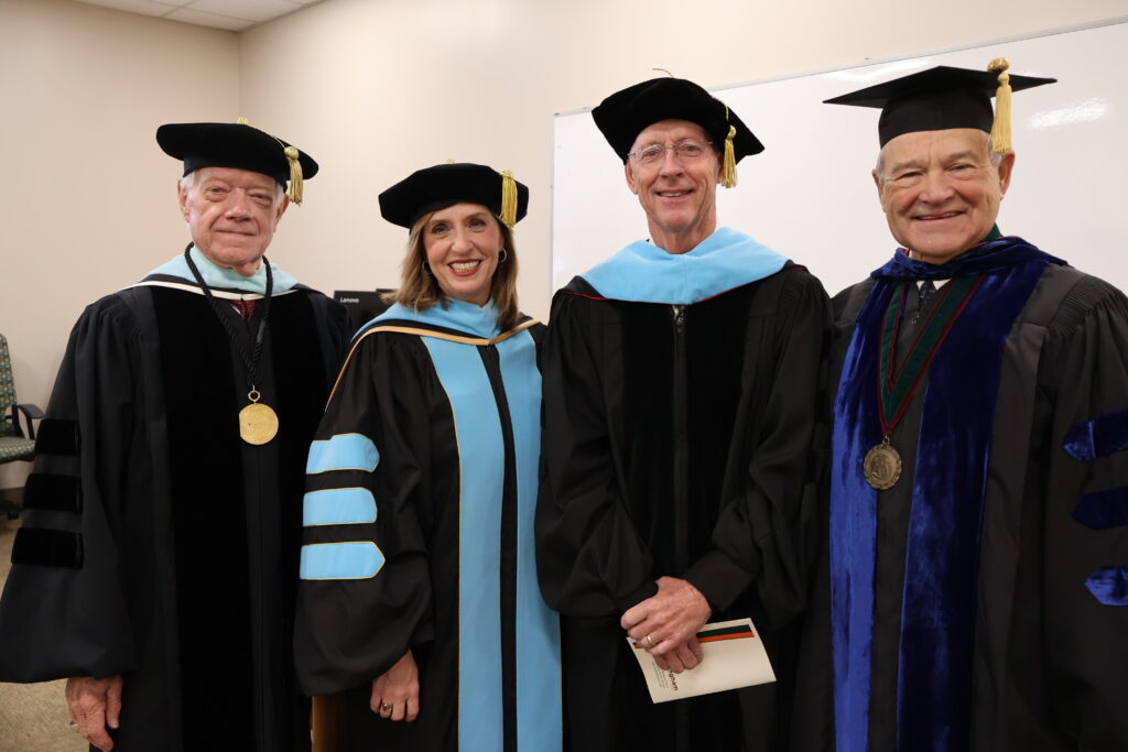 A group of people in academic regalia