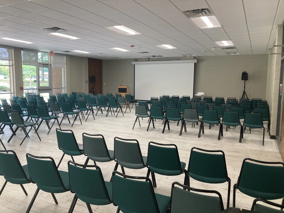 WSC Activity Room chairs lined up facing front of room.