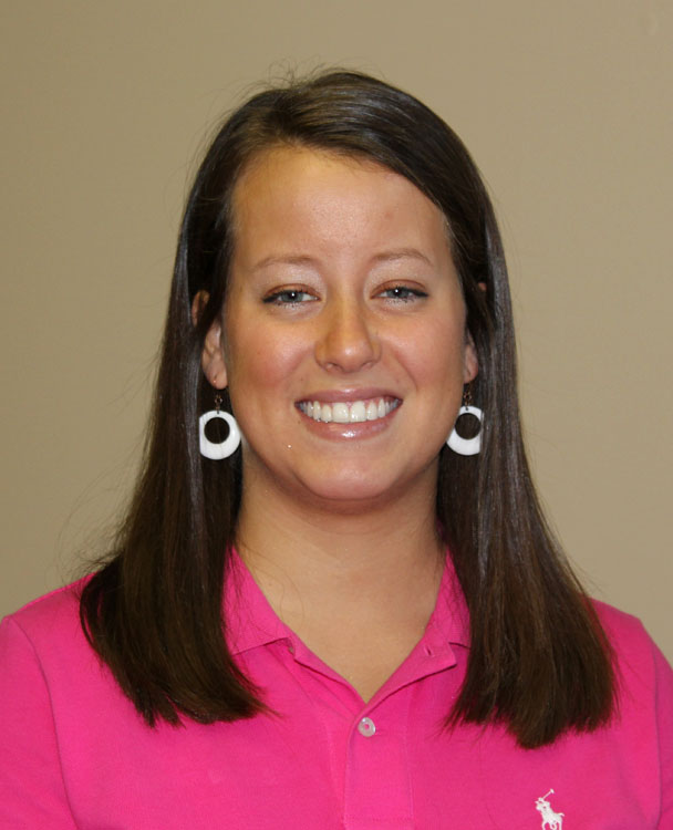 A young woman smiles