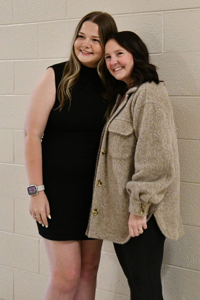 A PTK inductee and family member after the ceremony.