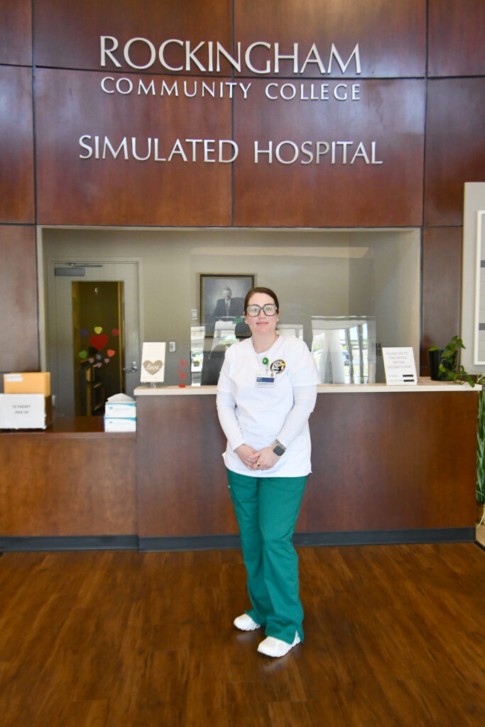 Nursing student Jessica Smith stands in the lobby of the Owens Health Science Building.