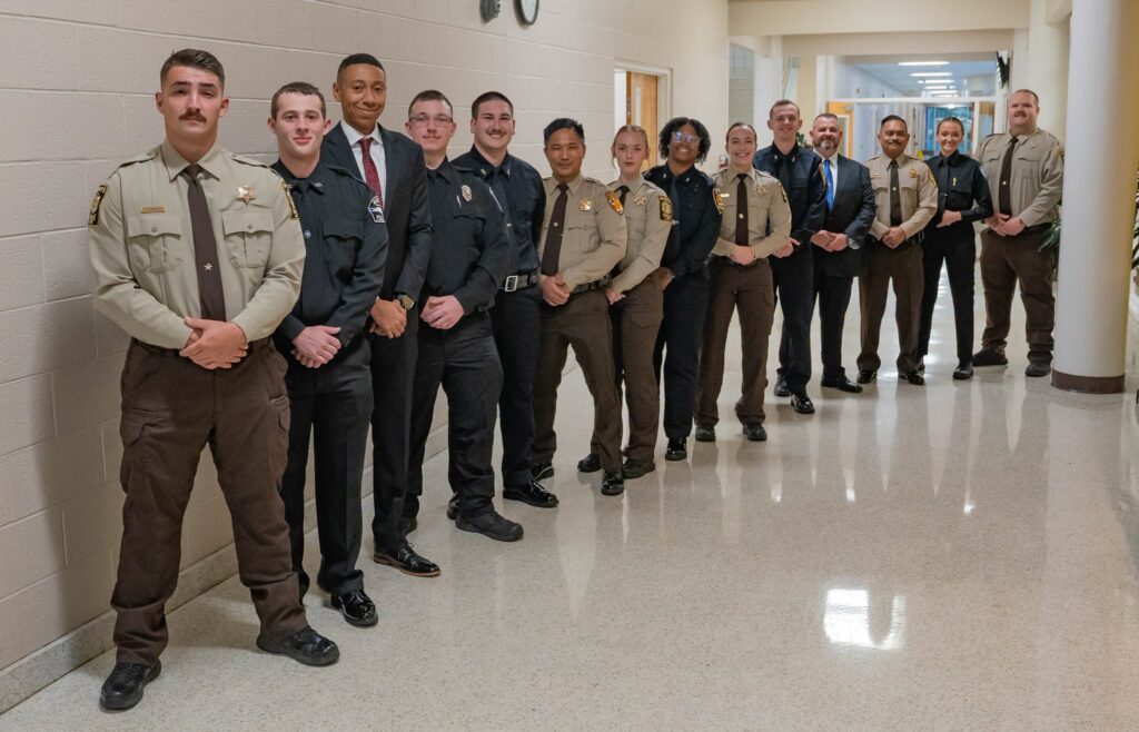 BLET cadets line up in the hall before their graduation ceremony.